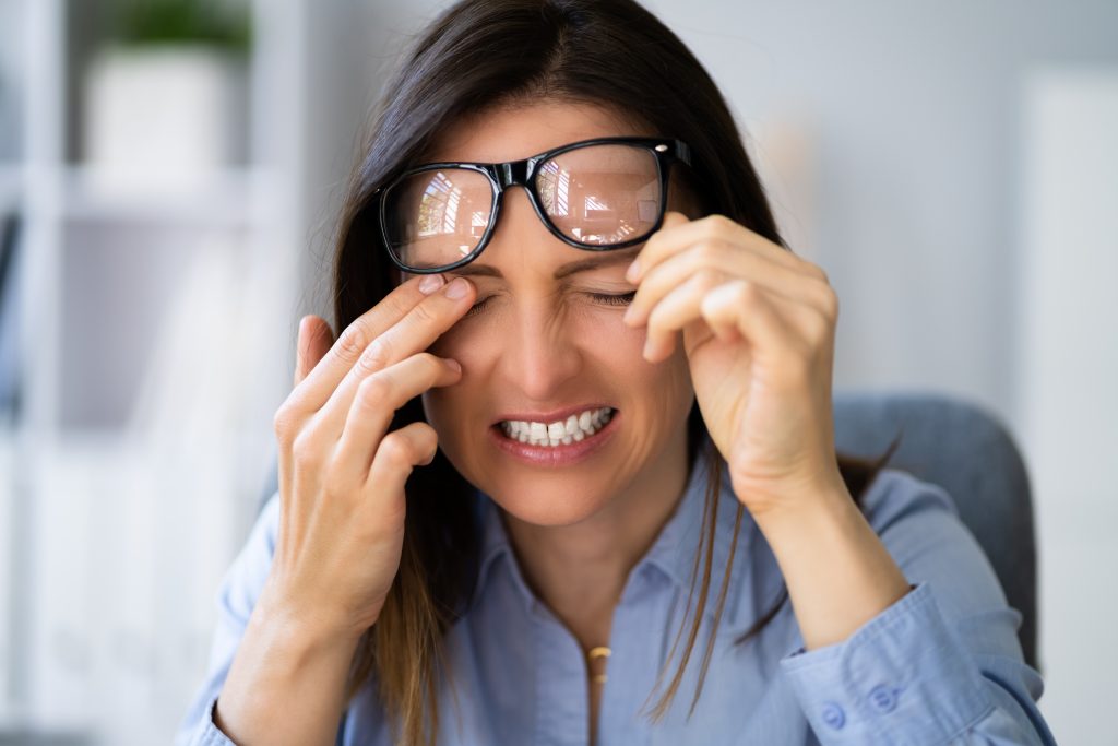 5 Types of Nerve Pain - Woman Rubbing Eyes