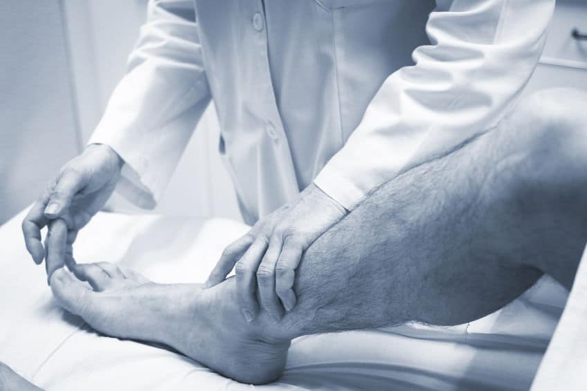 What is Ankle Arthritis? - Doctor Inspecting Foot