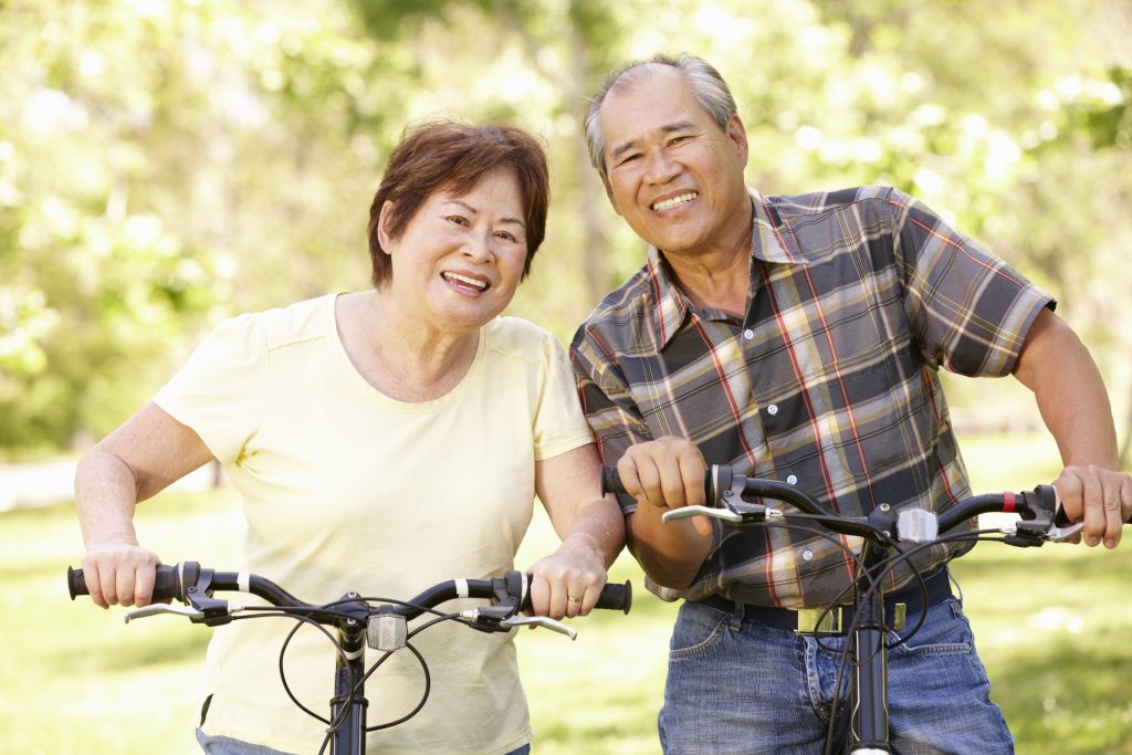 Dr. Warner's Favorite Methods For Improving Fascia Health - Couple Riding Bikes Together