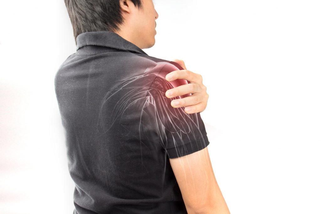 The Most Common Forms Of Nerve Pain - Man Grabbing Shoulder