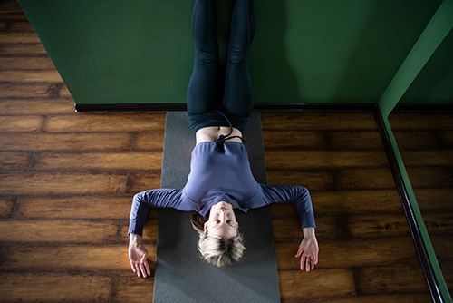 The Best Yoga Poses For Migraine Relief - Waterfall/Legs Up The Wall